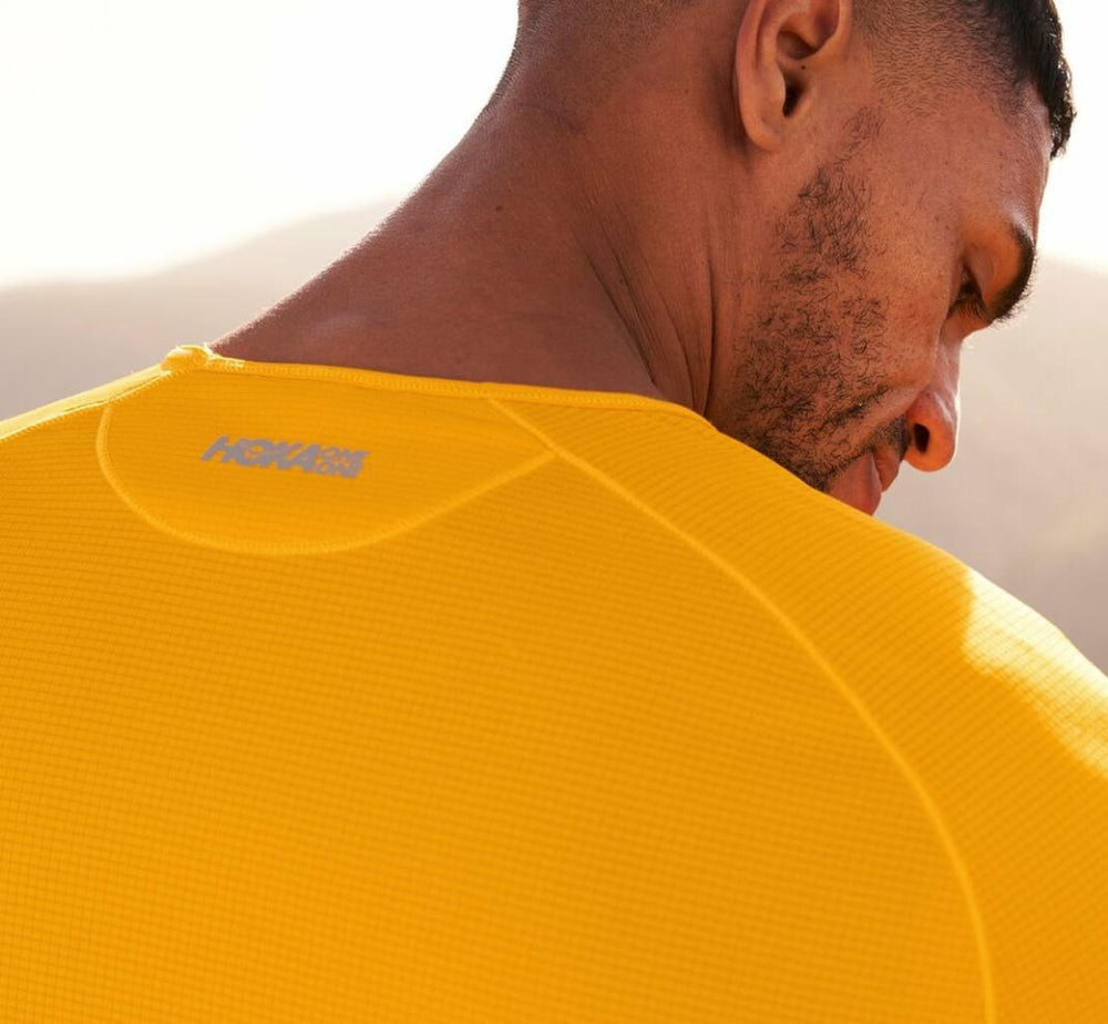 Men Tops | HOKA ONE ONE Wind Shirt Saffron